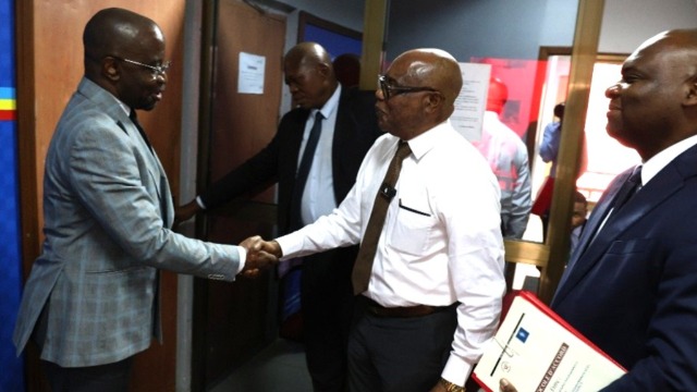 Elder David Ngabizele (center) , SE Monsieur le Ministre de la formation professionnelle(left) et Elie Twikala (right). Kinshasa, DRC, 13 avril 2026.jpg